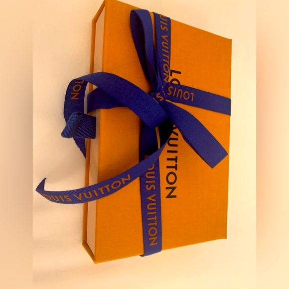 Authentic new rare and collectible LouisVuitton box with ribbon .